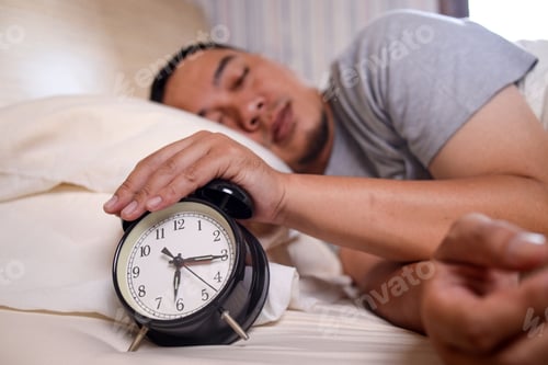 Preview: man snooze alarm clock