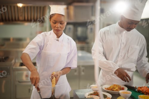 Preview: Culinary teamwork in a busy kitchen during a dinner service