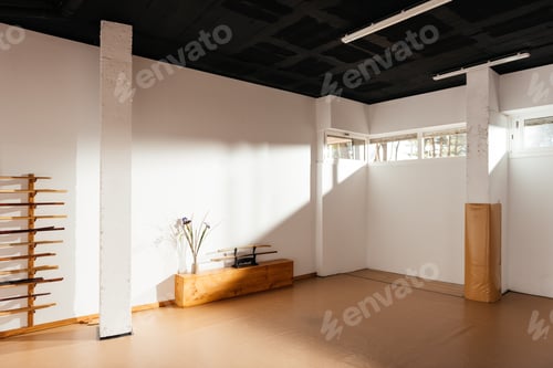 Preview: Sunlit Martial Arts Dojo With Training Weapons on Wooden Rack