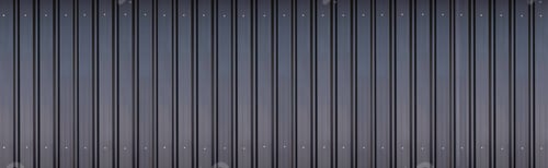 Preview: Panoramic view of black aluminium corrugated steel wall background with gradient light on surface