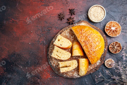 Preview: top view yummy sweet pastry sliced in pieces on dark background dough pie cake