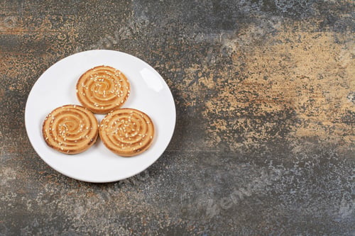 Preview: Yummy sesame seeds biscuits on white plate