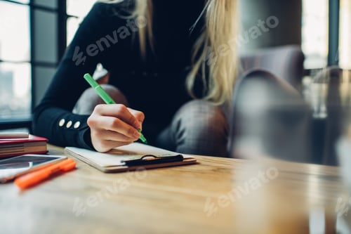 Preview: Cropped image of talented woman with marker creating sketches learning to be stylist