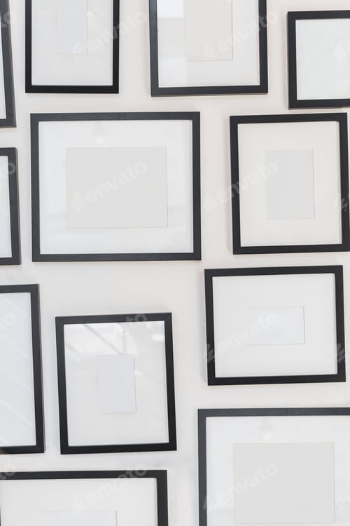 Preview: Blank picture frames set on the wall