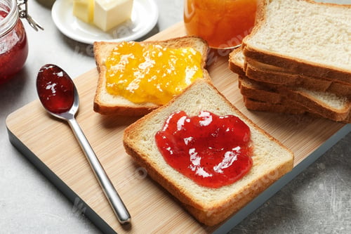 Preview: Toast bread with jams on wooden board