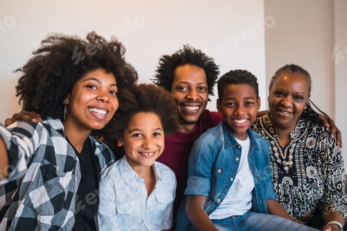 Preview: Happy Family Smiling Together Indoors at Home