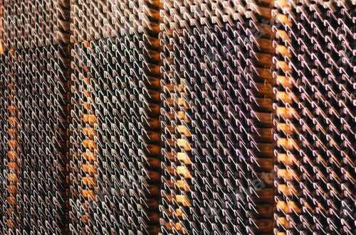 Preview: Wine bottles stored in a winery on the fermentation process