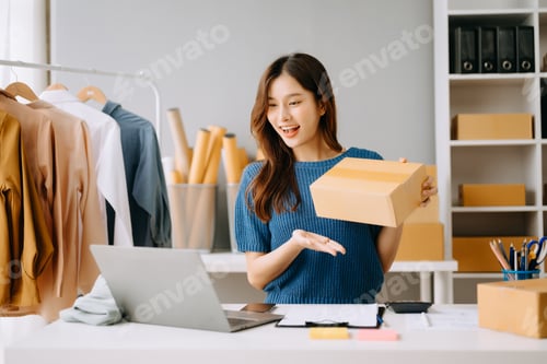Preview: Woman using smartphone or tablet taking receive and checking online purchase shopping order