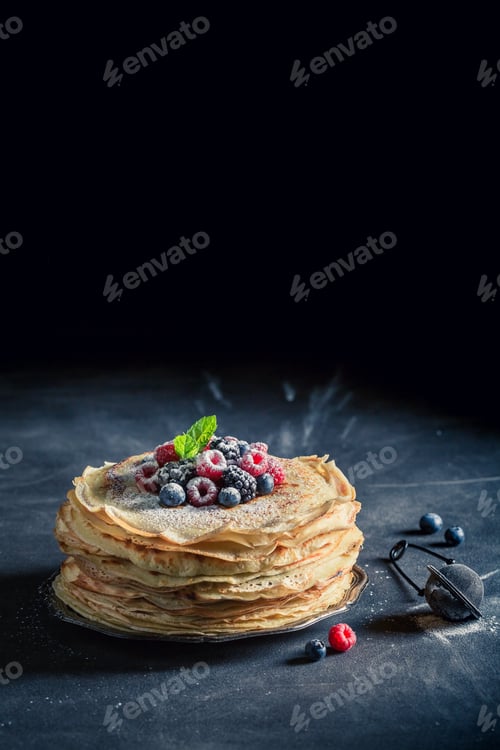 Preview: Tasty pancakes cake with blueberries and raspberries