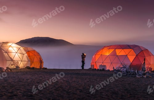 Preview: A serene twilight with illuminated geodesic domes above a sea of clouds.