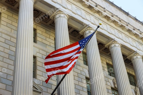 Preview: Washington DC building detail with waving American flag