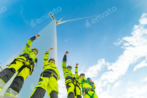 Preview: Team of engineers at a wind turbine power generation.