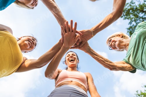 Preview: Senior women training with fitness coach at park