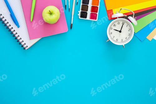 Preview: Various school education and office supplies, accessories on a blue background.