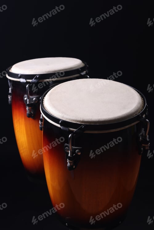 Preview: Different drums on a black background, percussion musical instruments
