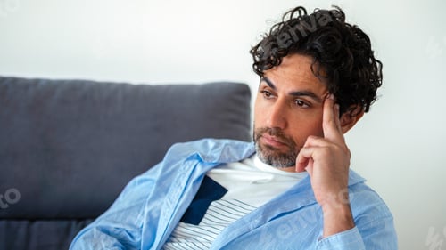 Preview: Portrait of handsome man wearing a shirt and thinking try solve problem pose