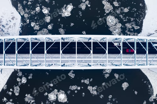 Preview: Floating floes on river and bridge. Aerial view of Poland