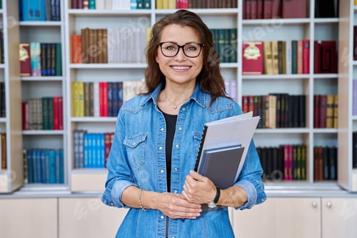 Preview: Portrait confident mature woman teacher, educational behavioral specialist in classroom