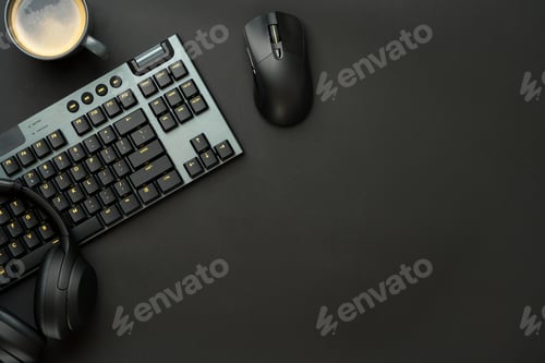 Preview: Headphones, computer mouse and keyboard on black background