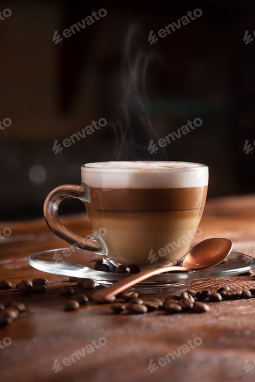 Preview: Cup of Coffe With Milk on a Dark Background. Hot Latte or Cappuccino Prepared With Milk