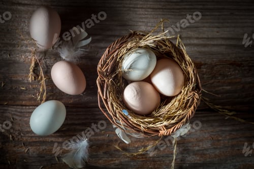 Preview: Top view of free range eggs in wicker basket