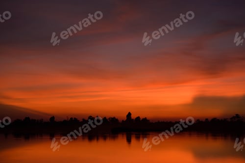 Preview: The beautiful nature with golden lake in sunset