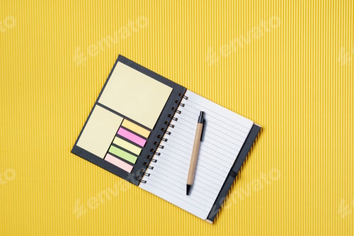 Preview: Spiral notebook on a yellow background