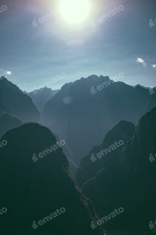 Preview: Mountain Range under the Sunlight in a Wilderness Area