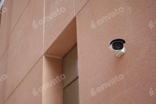 Preview: CCTV security camera operating on modern buildings outdoor