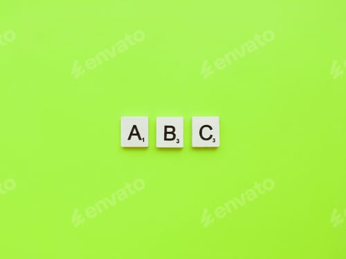 Preview: ABC scrabble letters word on a green background