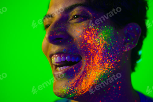Preview: Fashion model with fluo painting on the face