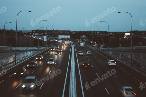 Preview: Traffic in the highway. Commuting. Vehicles. Low angle view. Transportation. Opposite.