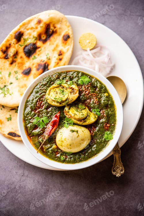 Preview: Spinach egg curry is an Indian non vegetarian dish made using palak gravy with eggs