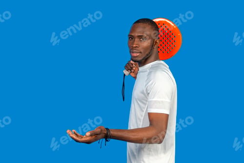 Preview: Padel player showing open hand on blue background