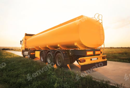 Preview: Modern yellow truck parked on country road