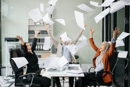 Preview: Diverse teams celebrating success in a lively office setting, capturing moments of joy, teamwork,