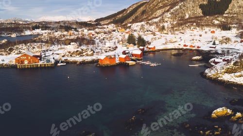 Preview: Aerial view from drone of small fishing bay with red wooden houses