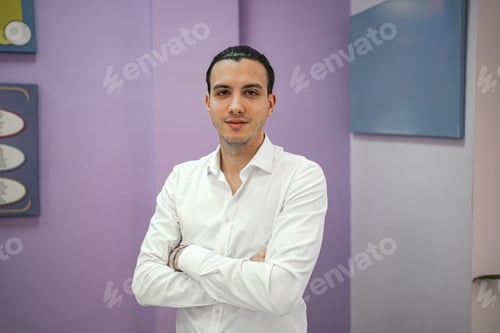 Preview: young adult male student in classroom