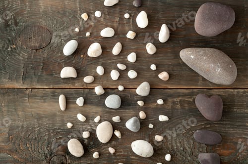 Preview: Sea stones on wooden background