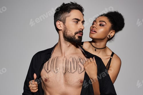 Preview: A passionate embrace between a couple in a stylish setting showcasing love and intimacy