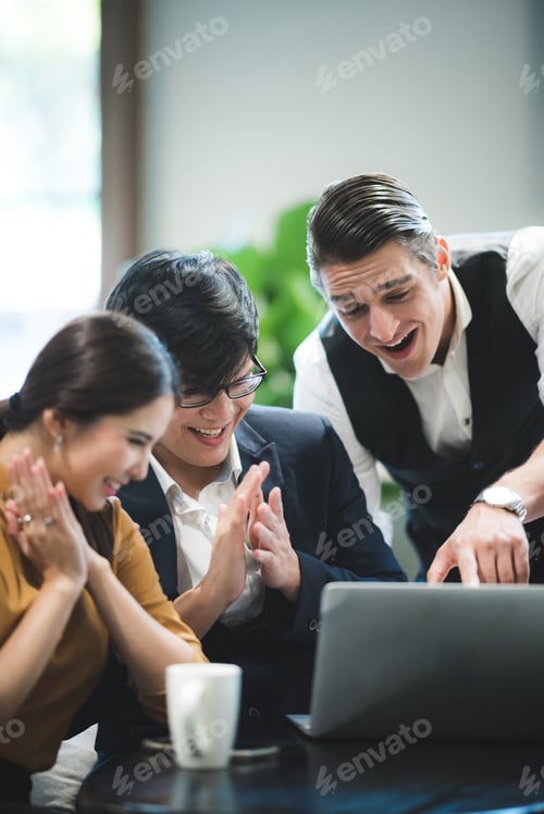 Preview: Successful business group of people at work in co-working space office