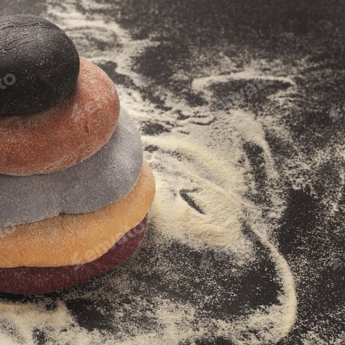Preview: Colorful fresh pasta dough on black table