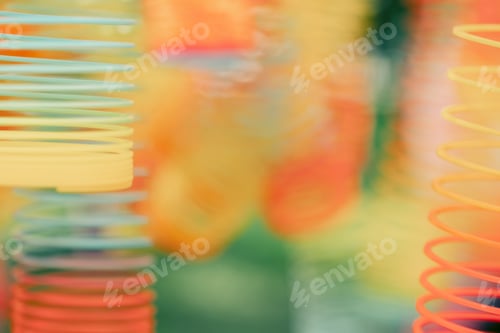 Preview: Lots of bright colorful spirals. Abstract blurred background with selective focus on waves