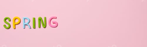Preview: The word "spring" is made of colored plasticine, laid out on a pink background.