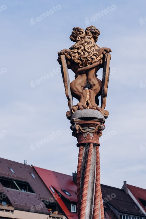 Preview: Golden lion statue near Ulm Cathedral Muenster