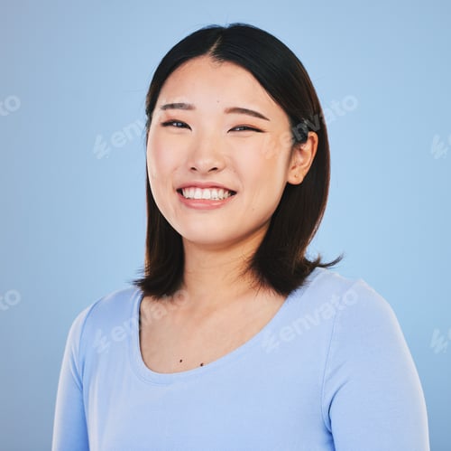 Preview: Happy, smile and portrait of Asian woman in a studio with a natural, makeup and beauty face. Self c