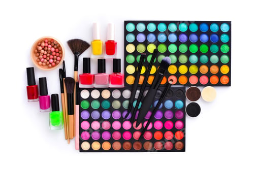 Preview: Set of decorative cosmetics and coloured nail polish bottles on