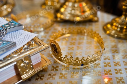 Preview: Two golden wedding crowns in tetrapods of church