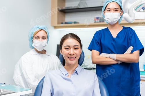 Preview: Portrait of Asian young woman patient and dentist at health care clinic.