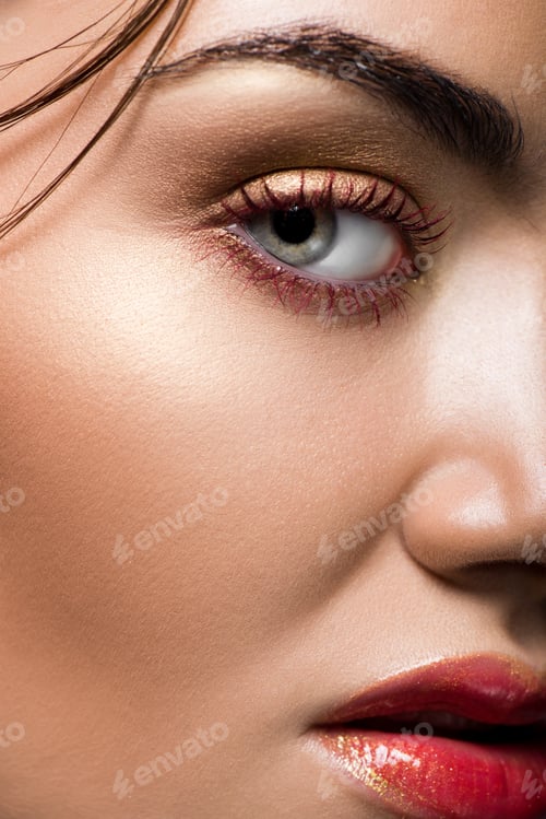 Preview: close up of beautiful model posing with makeup on face for fashion shoot